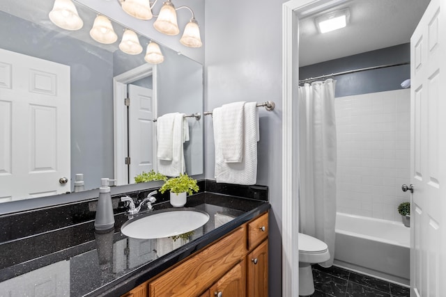 7701 Kelvinway Dr Unit 74, Columbus, OH 43085 - full bath featuring vanity, marble look tile flooring, and shower / bath combination with curtain