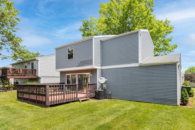 7701 Kelvinway Dr Unit 74, Columbus, OH 43085 - rear view of property with a deck and a yard