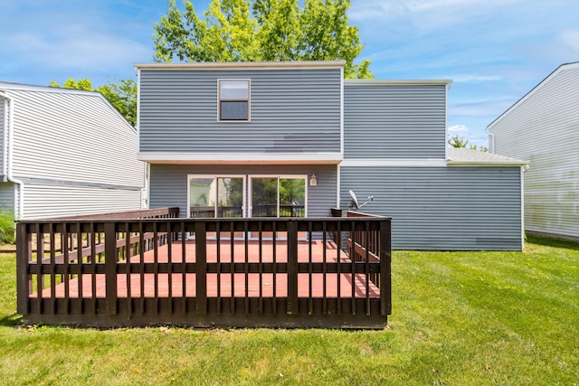 7701 Kelvinway Dr Unit 74, Columbus, OH 43085 - rear view of property featuring a wooden deck and a yard