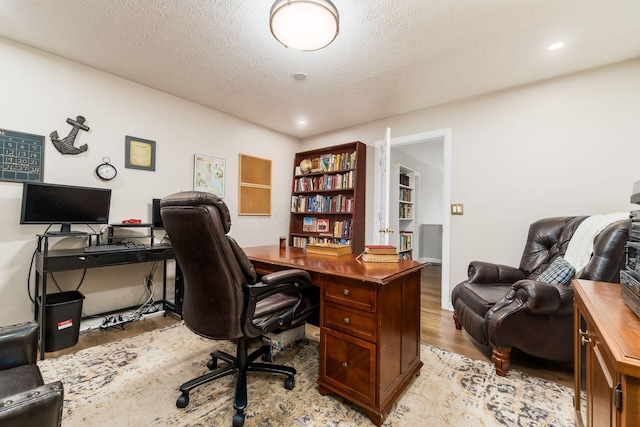 4867 Fosterson Dr, Lockbourne, OH 43137 - office area with light wood-type flooring and a textured ceiling