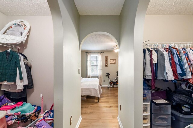 4867 Fosterson Dr, Lockbourne, OH 43137 - spacious closet with arched walkways and wood finished floors