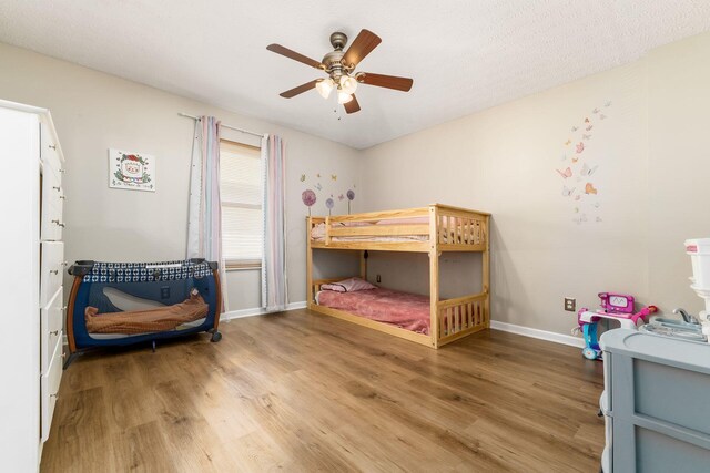 4867 Fosterson Dr, Lockbourne, OH 43137 - bedroom with light wood-style flooring and a ceiling fan