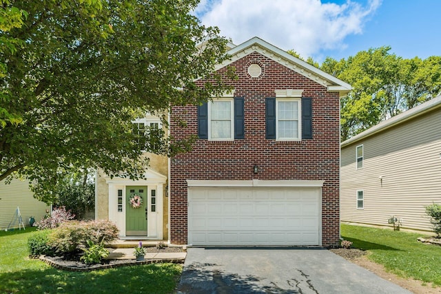 4867 Fosterson Dr, Lockbourne, OH 43137 - view of front facade featuring driveway, a garage, and brick siding