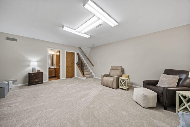 7982 Lewis Ave Unit 21, Dublin, OH 43017 - living area with stairway and carpet flooring