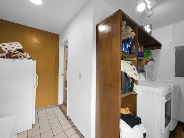 800 Spring Rd S, Westerville, OH 43081 - laundry area with washing machine and clothes dryer, electric panel, and light tile patterned flooring