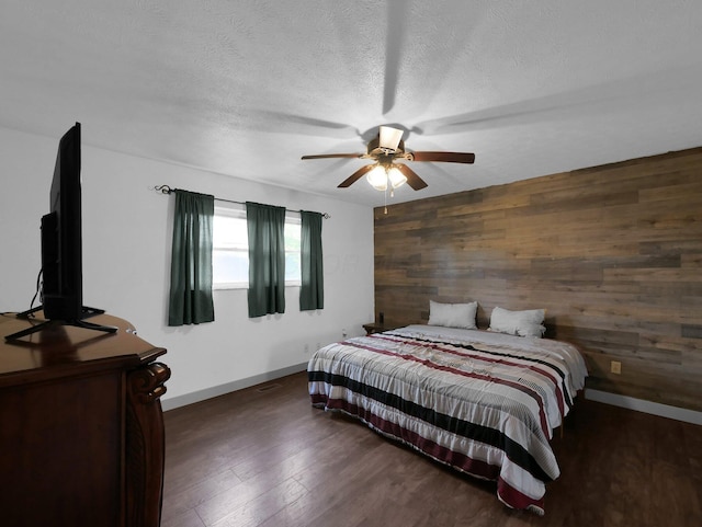 800 Spring Rd S, Westerville, OH 43081 - bedroom featuring wooden walls, wood finished floors, ceiling fan, and a textured ceiling
