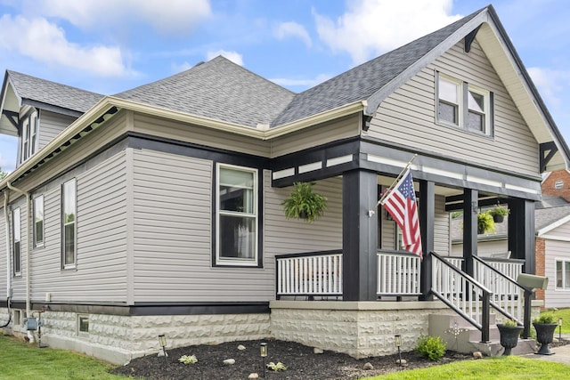 94 W Waterloo St, Canal Winchester, OH 43110 - view of property exterior featuring covered porch and a shingled roof