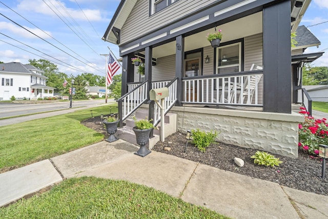 94 W Waterloo St, Canal Winchester, OH 43110 - view of front of house with a porch and a front lawn