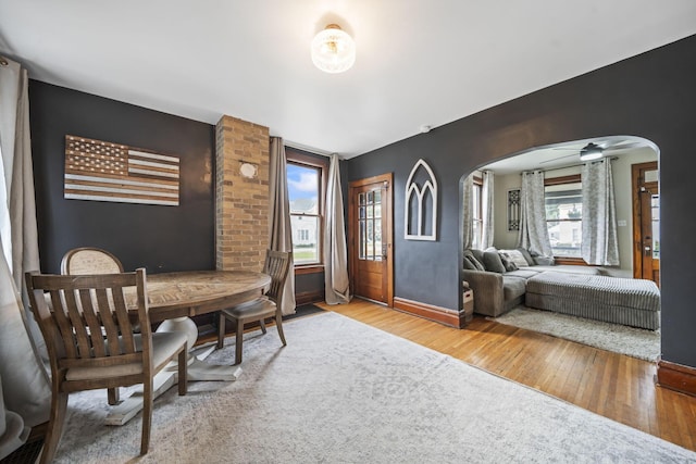 94 W Waterloo St, Canal Winchester, OH 43110 - dining area featuring arched walkways and hardwood / wood-style flooring