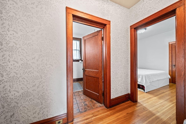 94 W Waterloo St, Canal Winchester, OH 43110 - corridor with wallpapered walls and light wood-style flooring
