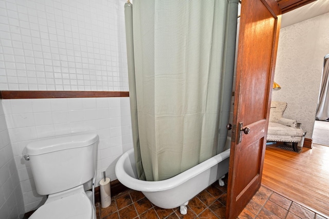 94 W Waterloo St, Canal Winchester, OH 43110 - full bathroom featuring tile walls, wallpapered walls, wainscoting, and shower / tub combo with curtain