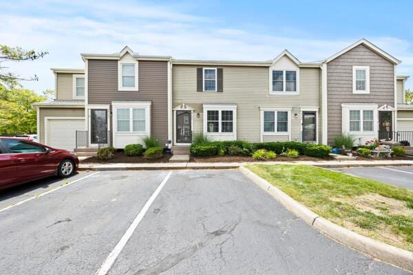 5153 Singleton Dr Unit 44B, Hilliard, OH 43026 - townhome / multi-family property featuring uncovered parking