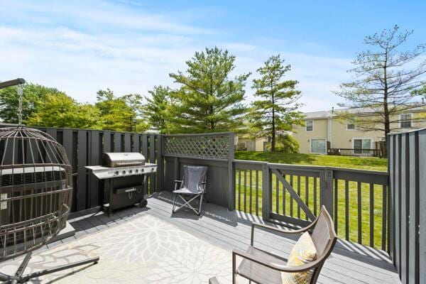 5153 Singleton Dr Unit 44B, Hilliard, OH 43026 - wooden deck with area for grilling