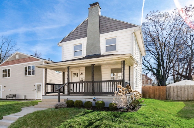 786 Ann St, Columbus, OH 43206 - view of front of home with covered porch and a chimney