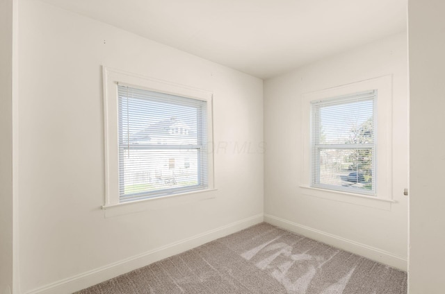 786 Ann St, Columbus, OH 43206 - spare room with plenty of natural light and light carpet