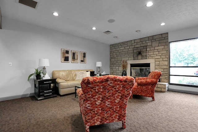 4686 Parrau Dr Unit 64A, Columbus, OH 43228 - carpeted living room with recessed lighting and a fireplace