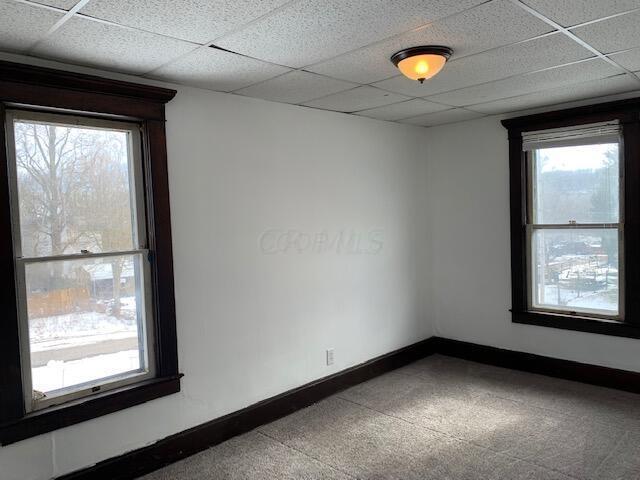 86 Curtis Ave, Newark, OH 43055 - unfurnished room featuring plenty of natural light and a paneled ceiling
