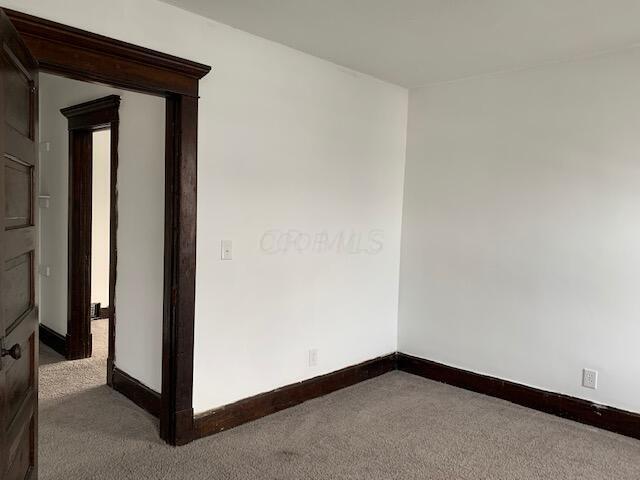 86 Curtis Ave, Newark, OH 43055 - carpeted spare room featuring baseboards