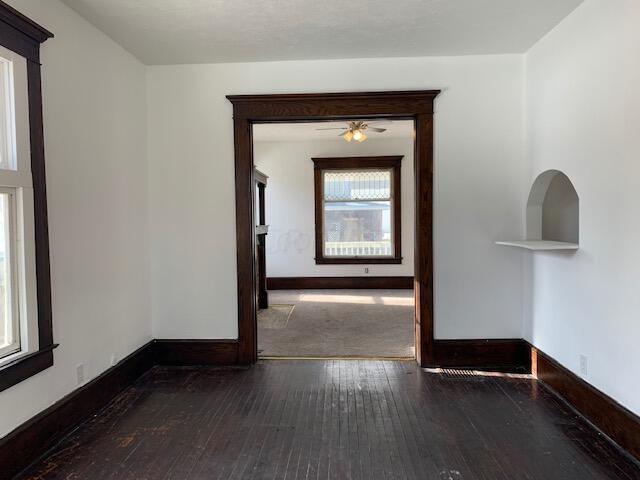 86 Curtis Ave, Newark, OH 43055 - spare room with dark wood-type flooring and baseboards