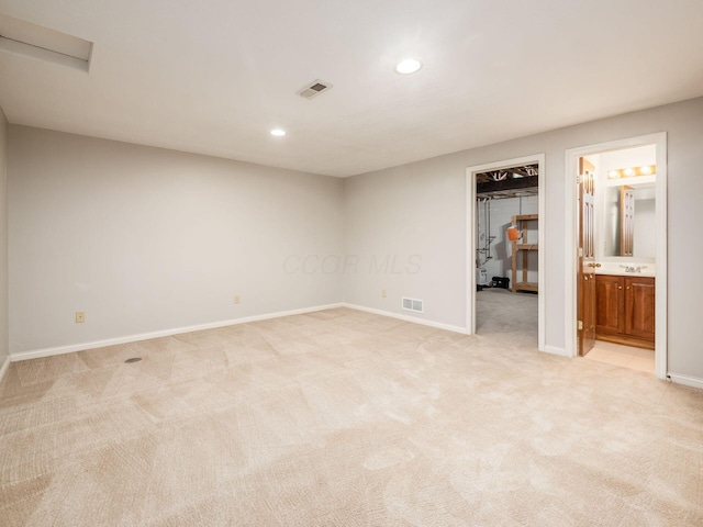 6003 Dunabbey Loop, Dublin, OH 43017 - unfurnished bedroom featuring light colored carpet, a walk in closet, recessed lighting, ensuite bathroom, and a closet
