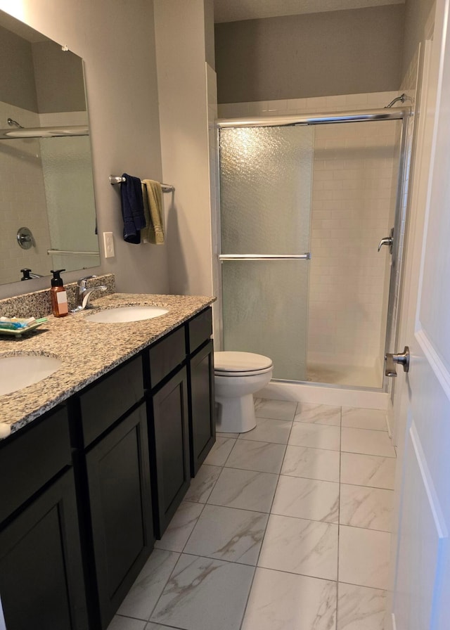 91 Neptune Ave, Newark, OH 43055 - full bathroom featuring marble finish flooring, a stall shower, and double vanity