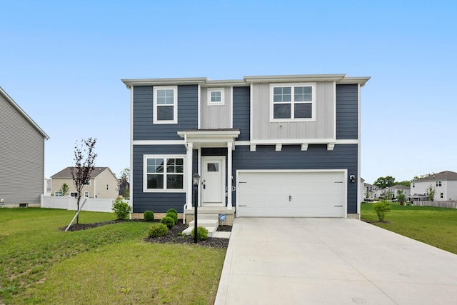 165 Norland Dr, Pickerington, OH 43147 - view of front of property with a garage, driveway, and board and batten siding