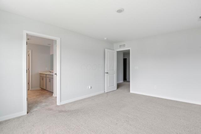 165 Norland Dr, Pickerington, OH 43147 - unfurnished bedroom featuring light carpet and ensuite bath
