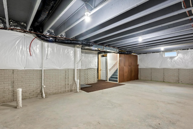 165 Norland Dr, Pickerington, OH 43147 - below grade area with stairs and brick wall