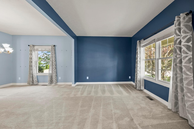 4003 Laurel Valley Dr, Powell, OH 43065 - carpeted spare room with baseboards and a chandelier