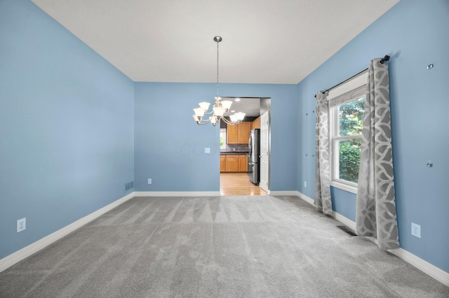4003 Laurel Valley Dr, Powell, OH 43065 - empty room with a chandelier and light colored carpet