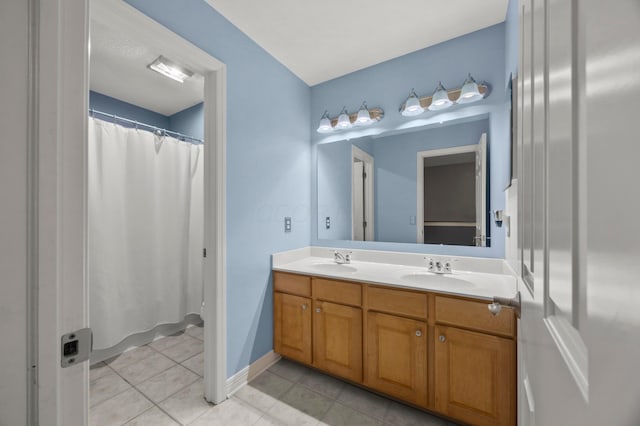 4003 Laurel Valley Dr, Powell, OH 43065 - full bathroom with tile patterned floors, double vanity, and a shower with shower curtain
