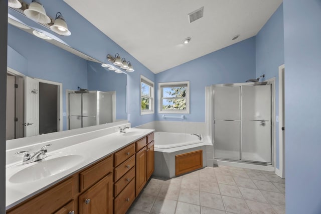 4003 Laurel Valley Dr, Powell, OH 43065 - full bath with a stall shower, a garden tub, lofted ceiling, double vanity, and tile patterned floors