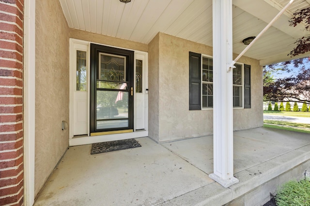 4003 Laurel Valley Dr, Powell, OH 43065 - property entrance featuring covered porch and stucco siding