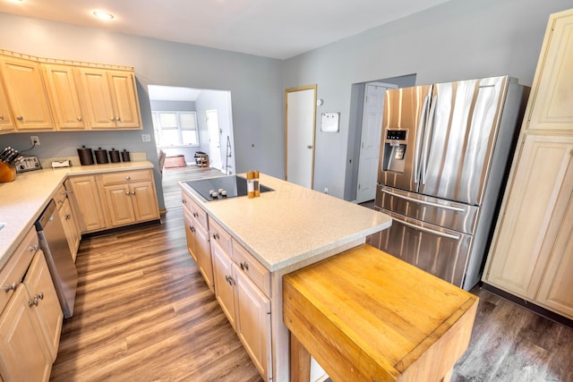 793 Waldo Fulton Rd, Waldo, OH 43356 - kitchen with stainless steel appliances, light brown cabinets, light countertops, wood finished floors, and recessed lighting
