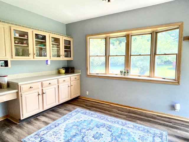 793 Waldo Fulton Rd, Waldo, OH 43356 - kitchen with wood finished floors, light countertops, and glass insert cabinets