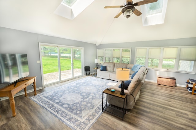 793 Waldo Fulton Rd, Waldo, OH 43356 - living area featuring a skylight, ceiling fan, dark wood finished floors, and high vaulted ceiling