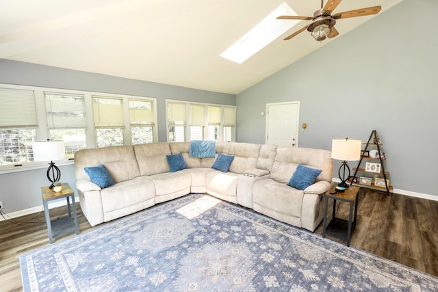 793 Waldo Fulton Rd, Waldo, OH 43356 - living room with wood finished floors, a ceiling fan, a skylight, and high vaulted ceiling