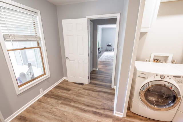 793 Waldo Fulton Rd, Waldo, OH 43356 - laundry area featuring washer / clothes dryer and wood finished floors