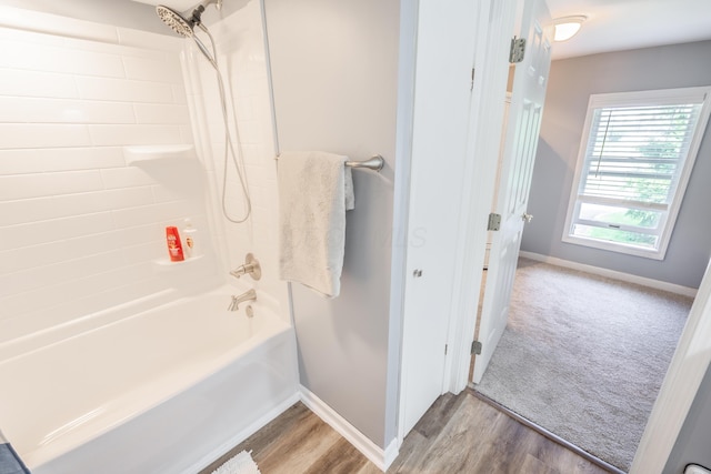 793 Waldo Fulton Rd, Waldo, OH 43356 - bathroom with shower / bath combination and wood finished floors