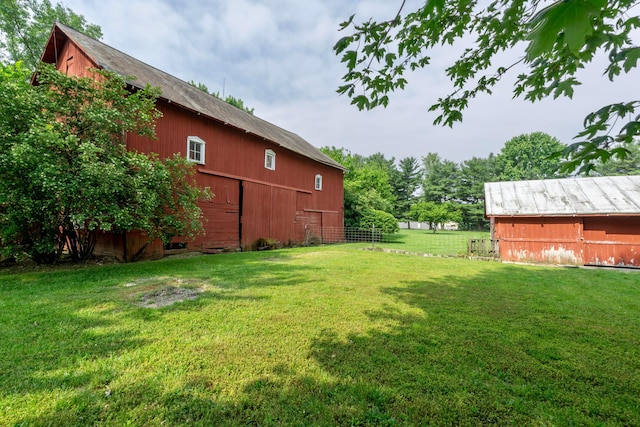 793 Waldo Fulton Rd, Waldo, OH 43356 - view of yard featuring a barn and an outbuilding