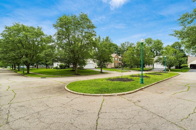 7954 Windrift Pl, Reynoldsburg, OH 43068 - view of road with street lighting, curbs, and a residential view