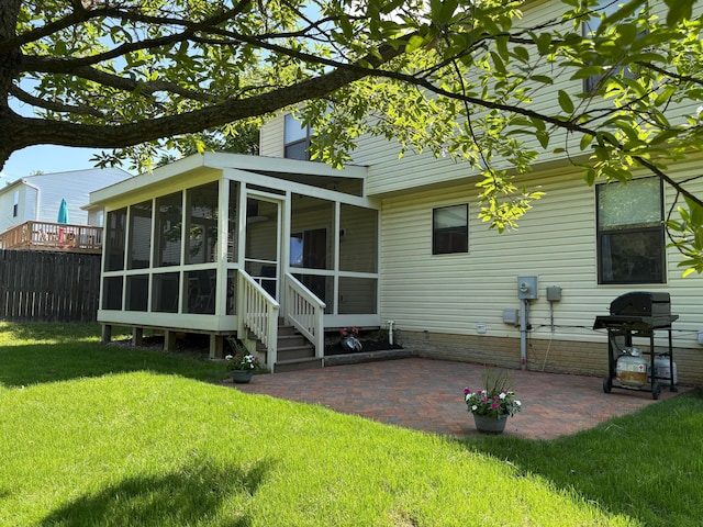 1439 Tall Meadows Dr, Columbus, OH 43223 - rear view of house featuring a sunroom and a patio