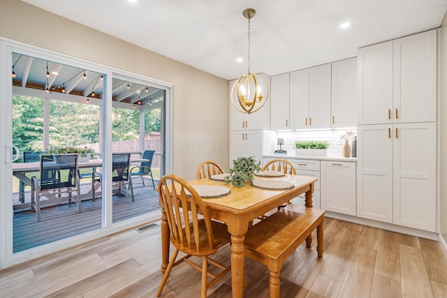 1439 Tall Meadows Dr, Columbus, OH 43223 - dining space with light wood-type flooring, a chandelier, and recessed lighting