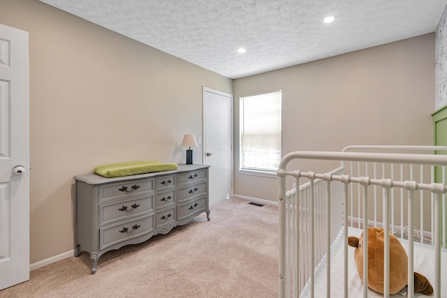 1439 Tall Meadows Dr, Columbus, OH 43223 - bedroom featuring light colored carpet, recessed lighting, and a textured ceiling