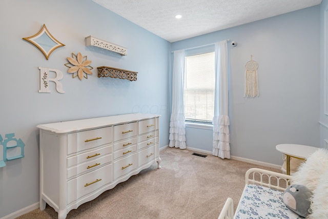 1439 Tall Meadows Dr, Columbus, OH 43223 - bedroom with light colored carpet, a textured ceiling, and recessed lighting