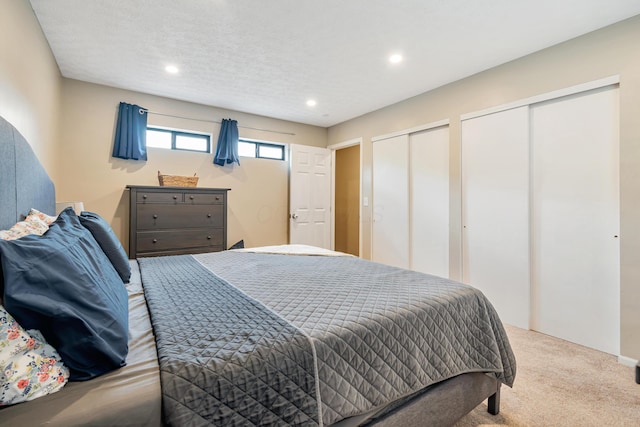 1439 Tall Meadows Dr, Columbus, OH 43223 - bedroom with multiple closets, carpet floors, and recessed lighting