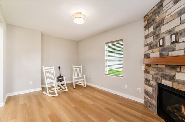 600 Courtright Dr E, Pickerington, OH 43147 - living area with light wood-type flooring and a fireplace