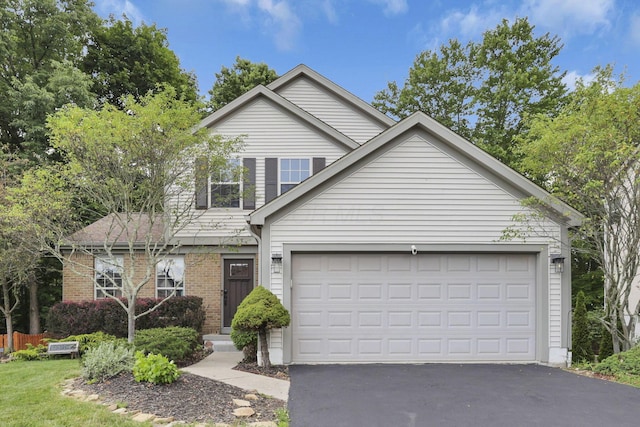 437 Barrington Rdg, Pataskala, OH 43062 - traditional-style house with driveway, an attached garage, and brick siding
