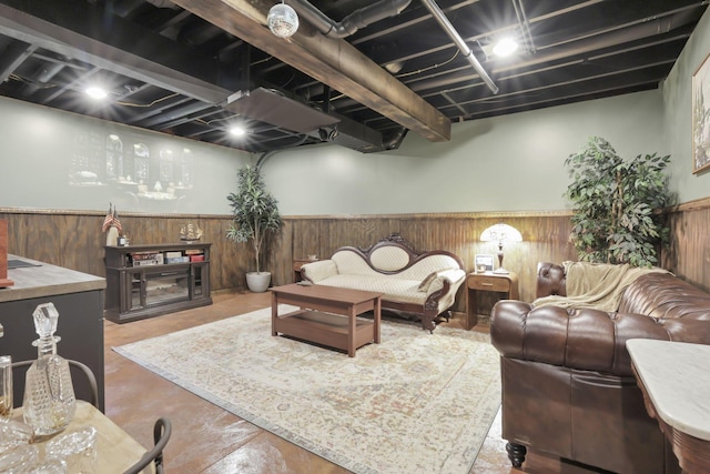 437 Barrington Rdg, Pataskala, OH 43062 - living room with a wainscoted wall, concrete floors, and wood walls