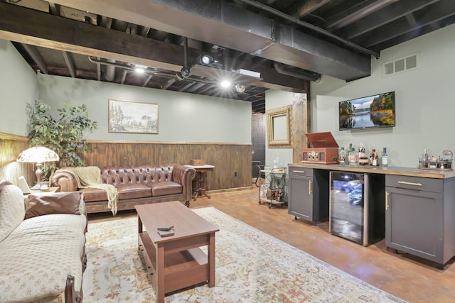 437 Barrington Rdg, Pataskala, OH 43062 - living area with beverage cooler, a bar, wainscoting, and wooden walls